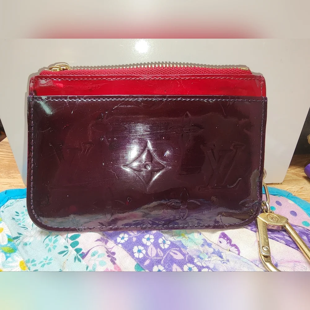 used rehabbed louis vuitton key pouch